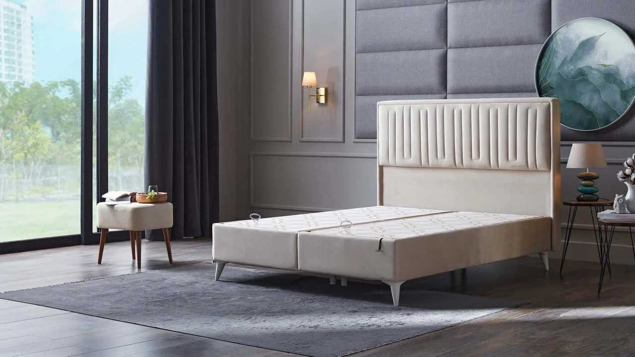 Pat tapitat cu lada si somiera rabatabila Petra 180x200, culoare Crem, Picior Alb BELLONA Paturi Tapitate Pat tapitat cu lada si somiera rabatabila Petra 180x200, culoare Crem, Picior Alb BELLONA Paturi Tapitate